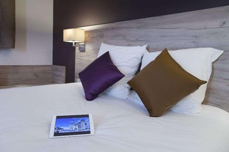 Brit Hotel Saumur Distré Rom bilde